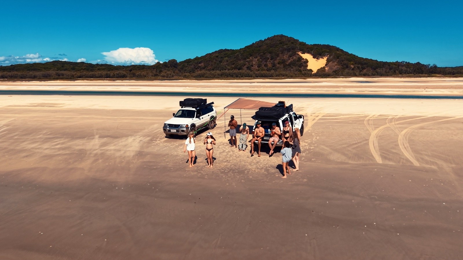 Aerial view of Campfire Crew vehicles and travellers on Moreton Island
